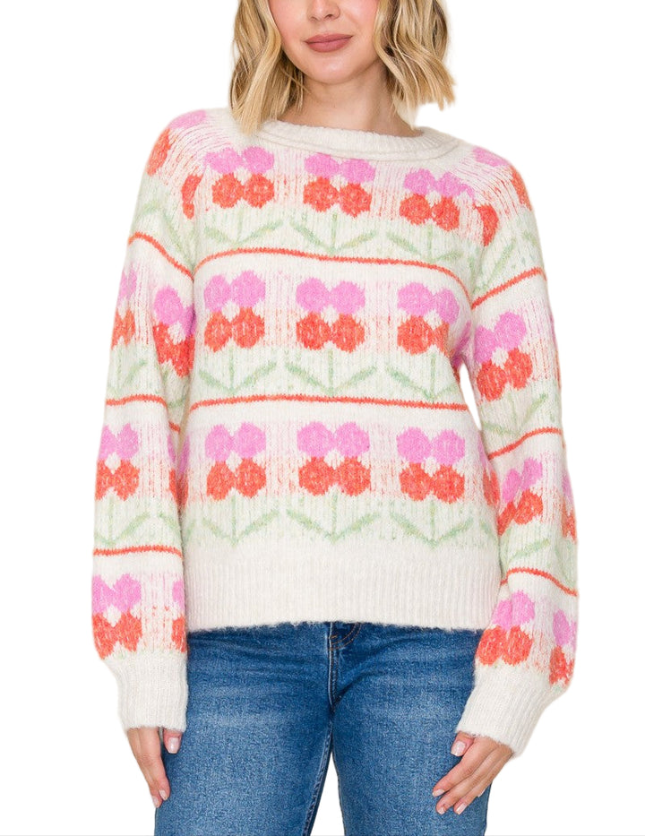 Stay cozy and stylish with the Loring Flower Jacquard Chunky Sweater. Its bold floral jacquard pattern adds a fun pop of texture, while the chunky knit keeps you warm on chilly days. Perfect for layering or wearing solo, this sweater brings cheerful comfort to your everyday wardrobe.