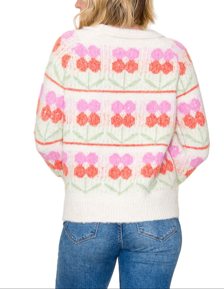 Stay cozy and stylish with the Loring Flower Jacquard Chunky Sweater. Its bold floral jacquard pattern adds a fun pop of texture, while the chunky knit keeps you warm on chilly days. Perfect for layering or wearing solo, this sweater brings cheerful comfort to your everyday wardrobe.