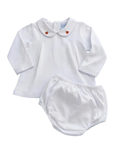 A white long-sleeve baby romper with a Peter Pan collar featuring two small red embroidered accents, paired with matching white bloomers, laid flat on a light blue background.