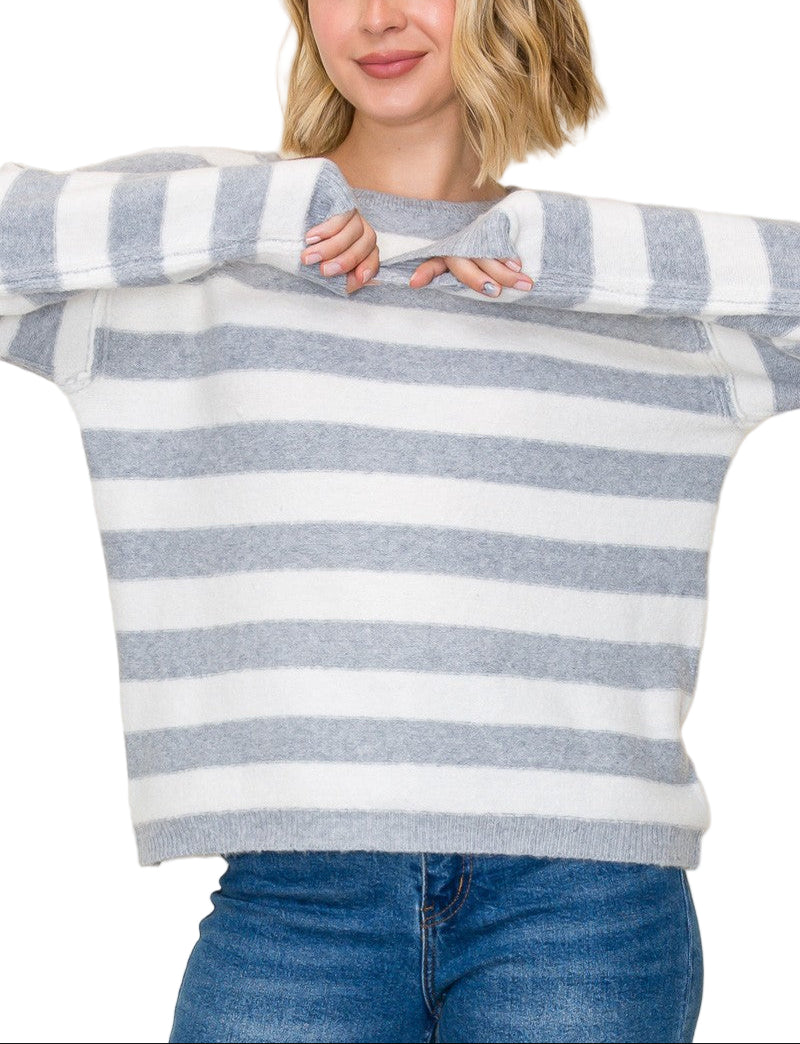 Wrap yourself in cozy charm with the Shannon Striped Crew Neck Sweater. Its playful stripes and classic crew neck make it the perfect pick for brightening up chilly days. Soft and comfortable, this sweater pairs effortlessly with your favorite jeans or skirts for a fun, laid-back look. Get ready to turn heads and stay snug all season long!