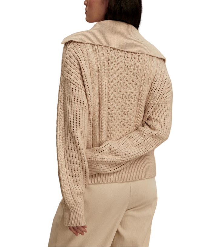 The perfect pairing for tailored pants, the Camello 2.0 is an elegant half-zip sweat made from an updated luxurious wool-blend for both warmth and style. The classic placement cable stitch and signature oversized collar elevate the design.