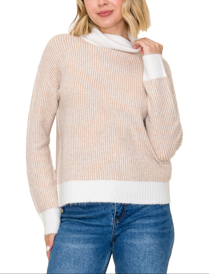 Stay cozy and chic with the Jessica 2 Tone Ribbed Turtleneck Sweater! Its playful blend of two tones adds a fun twist to your fall wardrobe, while the ribbed texture ensures a flattering fit that keeps you warm. Perfect for layering or wearing solo, this sweater brings a splash of style to any casual outing.