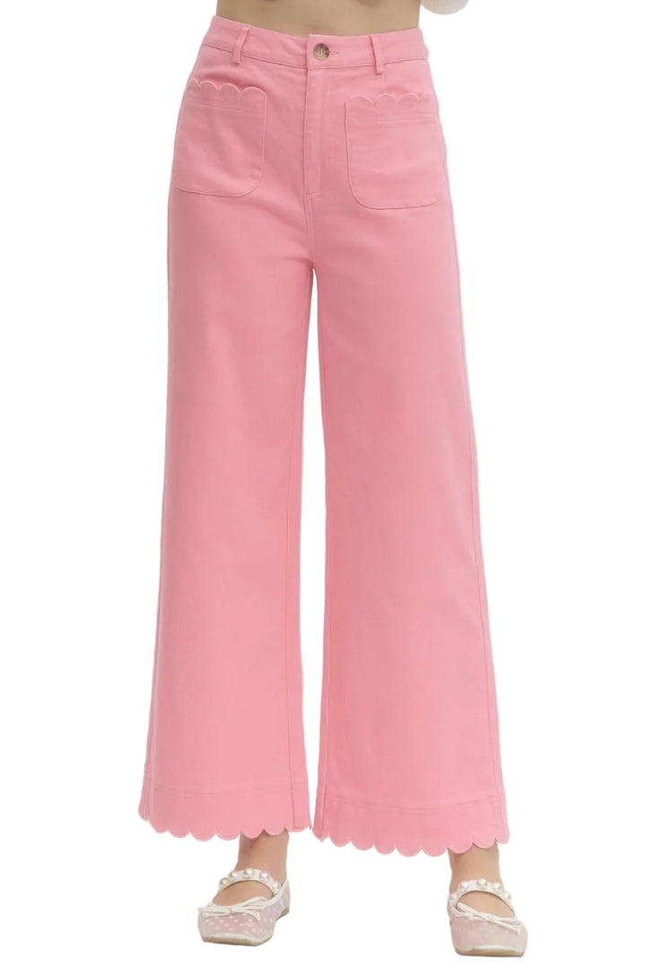 Elevate your everyday style with these charming pink pants featuring a flattering high-waist cut. Delicate scallop trim adorns the pockets and hem, adding a whimsical touch that sets them apart from basic basics. Perfect for dressing up casual looks or creating effortlessly chic outfits, these pants blend comfort with personality. The thoughtful details make them a versatile wardrobe essential that works from office to weekend adventures.
