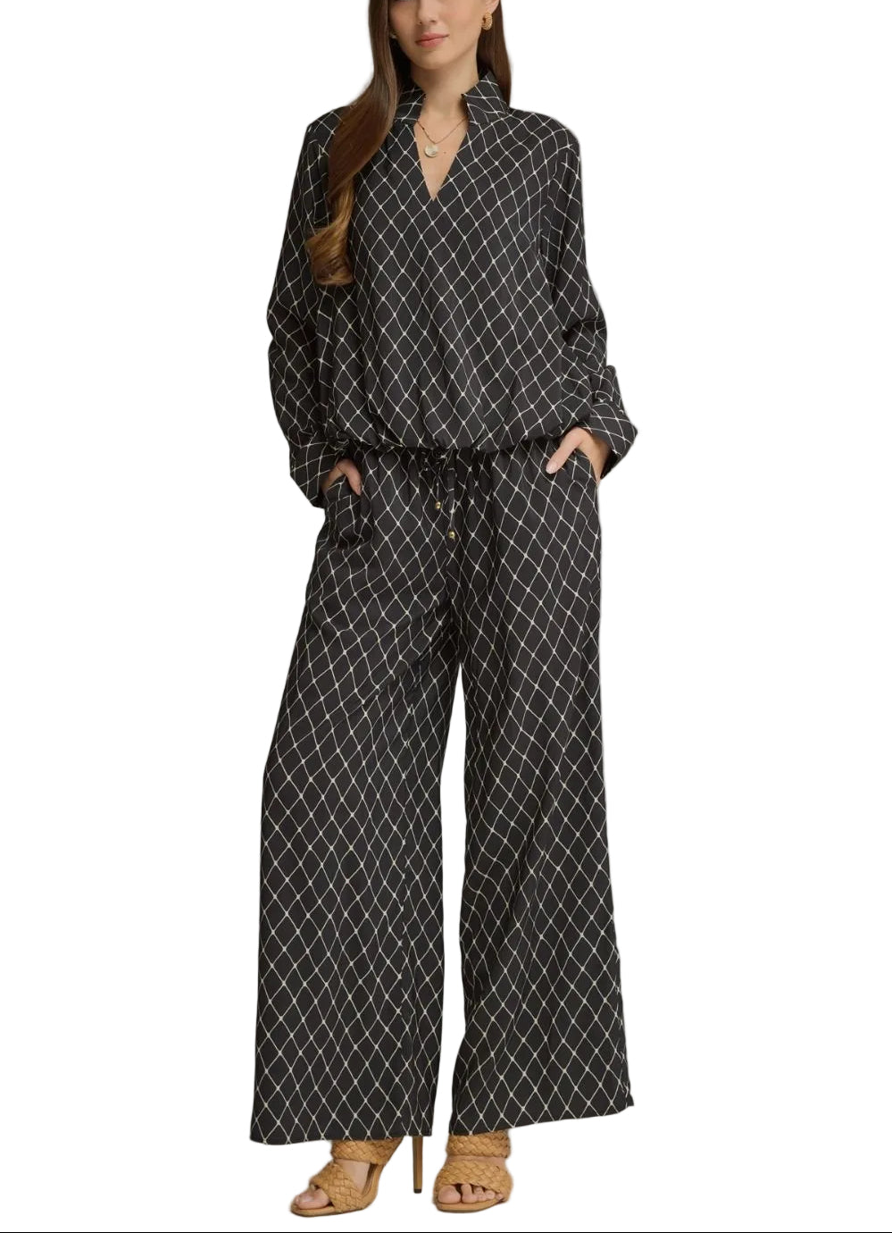 Geometric print long sleeve top with a split neckline. Gathered detail at back neckline. Button cuffs. Lined.  Geometric print wide leg pants with an elastic waist and self-tie drawstring. Side pockets. Lined.