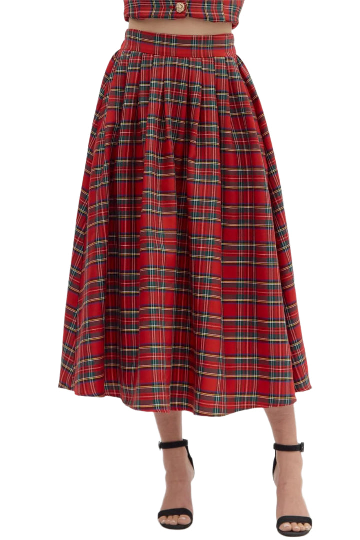 Plaid pattern pull-on midi skirt. Elasticated waistband at back. Pockets at sides. Unlined. Woven. Non-sheer. Lightweight.