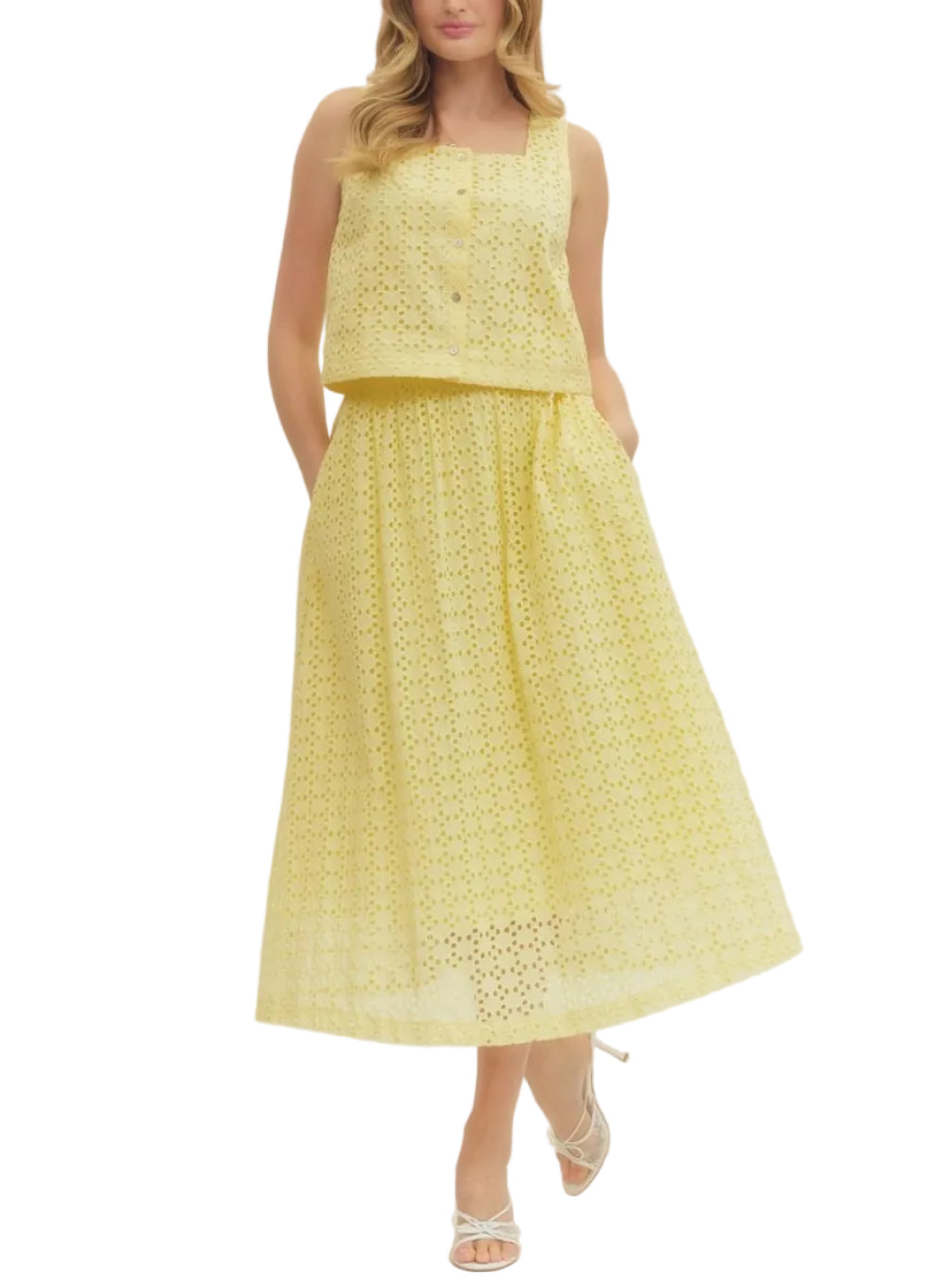 Eyelet midi skirt and matching top.Featuring elasticated waistband at back and side zipper closure. Pocket at side. Lined. Woven. Semi-sheer. Lightweight.
