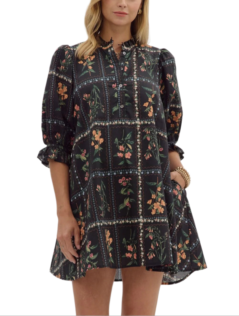 Solid pleated shoulder puff sleeve ruffle hem mini dress. Ruffle band collar button closure at front. Side pockets. Lined. Woven. Non-sheer. Lightweight.