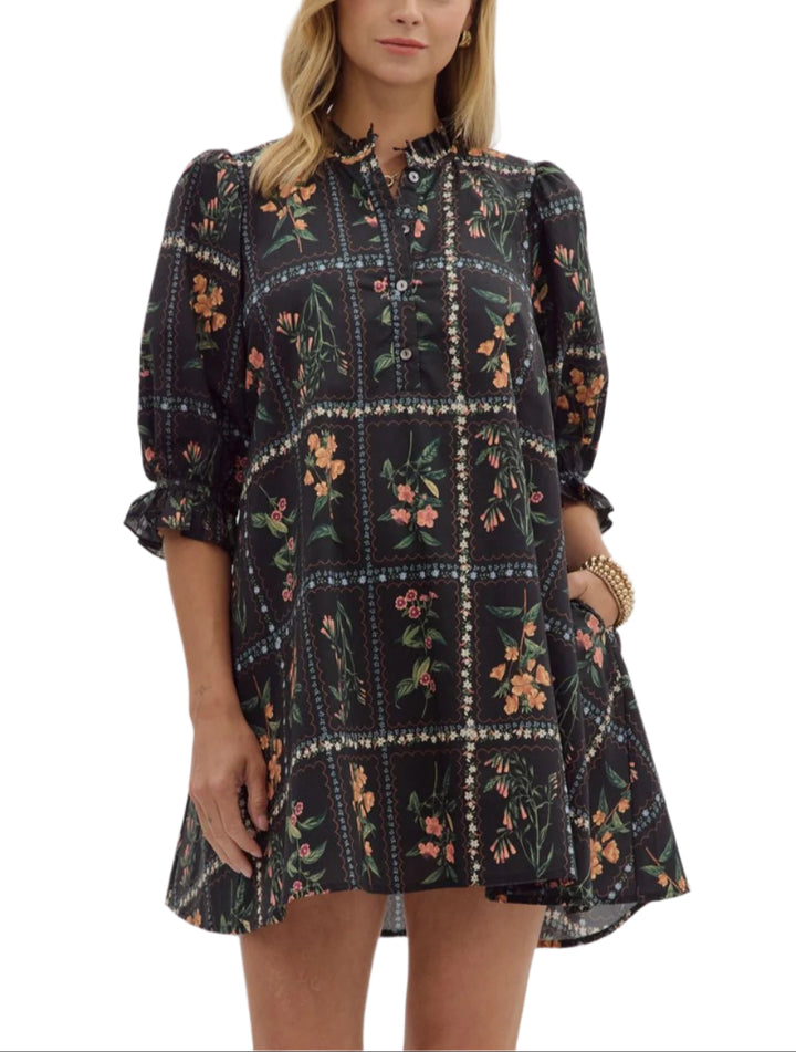 Solid pleated shoulder puff sleeve ruffle hem mini dress. Ruffle band collar button closure at front. Side pockets. Lined. Woven. Non-sheer. Lightweight.
