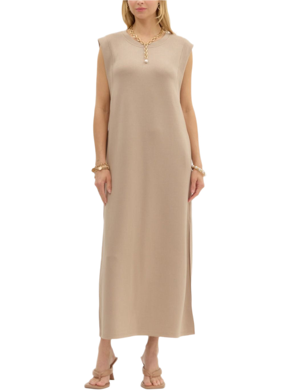Solid jersey knit pullover midi dress featuring side slit hem. Pockets at sides. Unlined. Knit. Non-sheer. Lightweight.