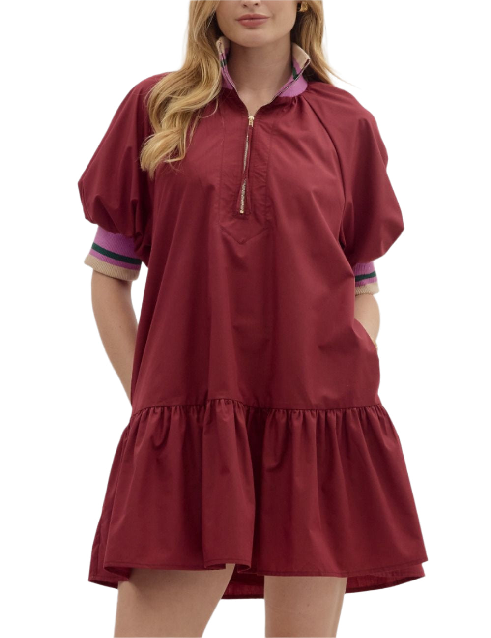 Solid puff sleeve ruffle hem mini dress featuring multicolor accent band and zipper closure at front neck. Pockets at sides. Lined. Woven. Non-sheer. Lightweight.