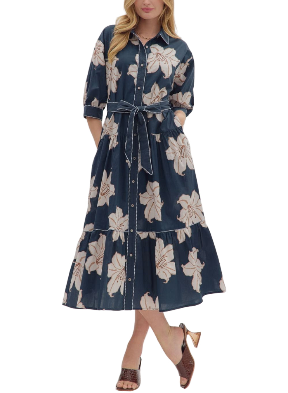 Floral print 3/4 sleeve midi dress featuring button closure at front and detachable waist tie belt. Side pockets. Lined. Woven. Non-sheer. Lightweight.
