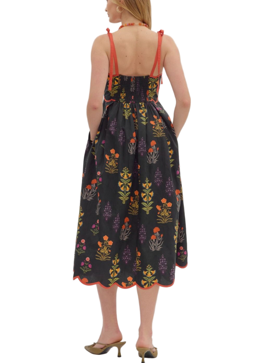 Floral print tie strap midi dress featuring scalloped straight neckline with binding detail and pleated waist. Smocked back. Side pockets. Lined. Woven. Non-sheer. Lightweight.
