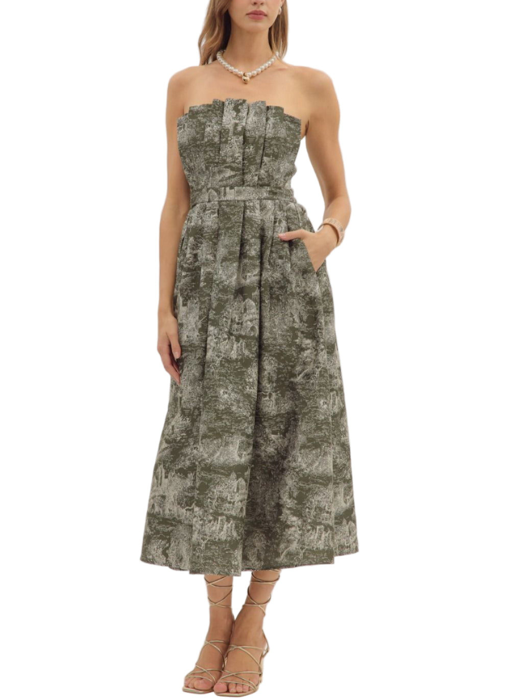Printed strapless midi dress featuring ruffled straight neckline and pleated skirt. Zip closure at back. Smocked back panel. Side pockets. Unlined. Woven. Non-sheer.
