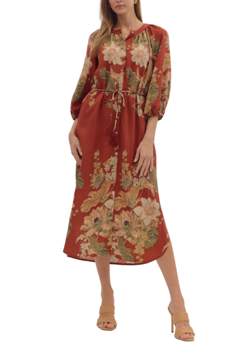 Floral print long sleeve midi dress featuring button closure at front and adjustable drawstring waist. Elasticated sleeve openings. Side pockets. Lined. Woven. Non-sheer. Lightweight.
