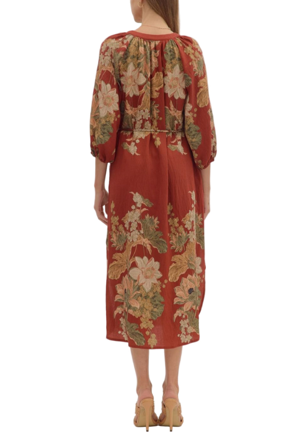 Floral print long sleeve midi dress featuring button closure at front and adjustable drawstring waist. Elasticated sleeve openings. Side pockets. Lined. Woven. Non-sheer. Lightweight.
