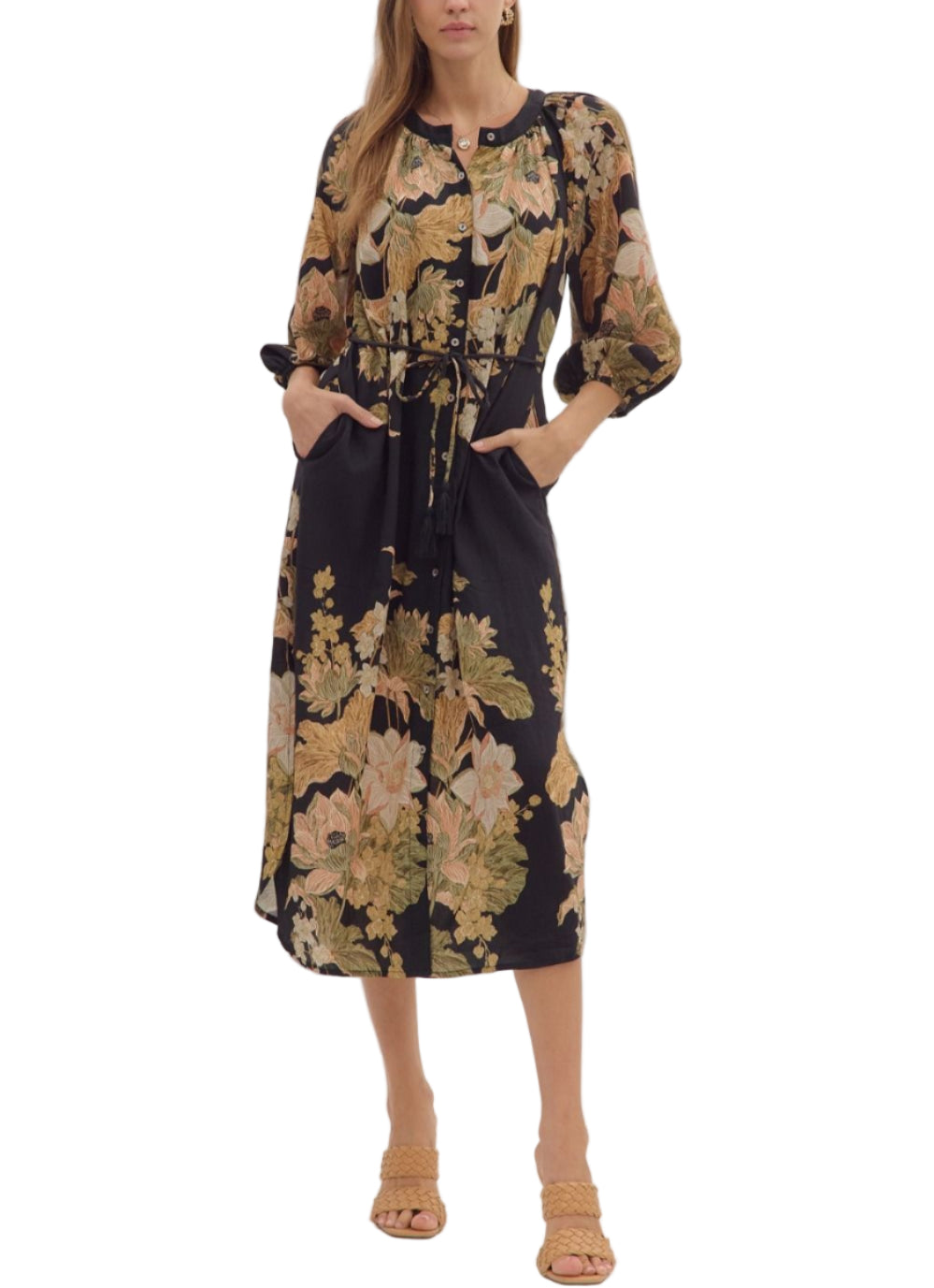 Floral print long sleeve midi dress featuring button closure at front and adjustable drawstring waist. Elasticated sleeve openings. Side pockets. Lined. Woven. Non-sheer. Lightweight.
