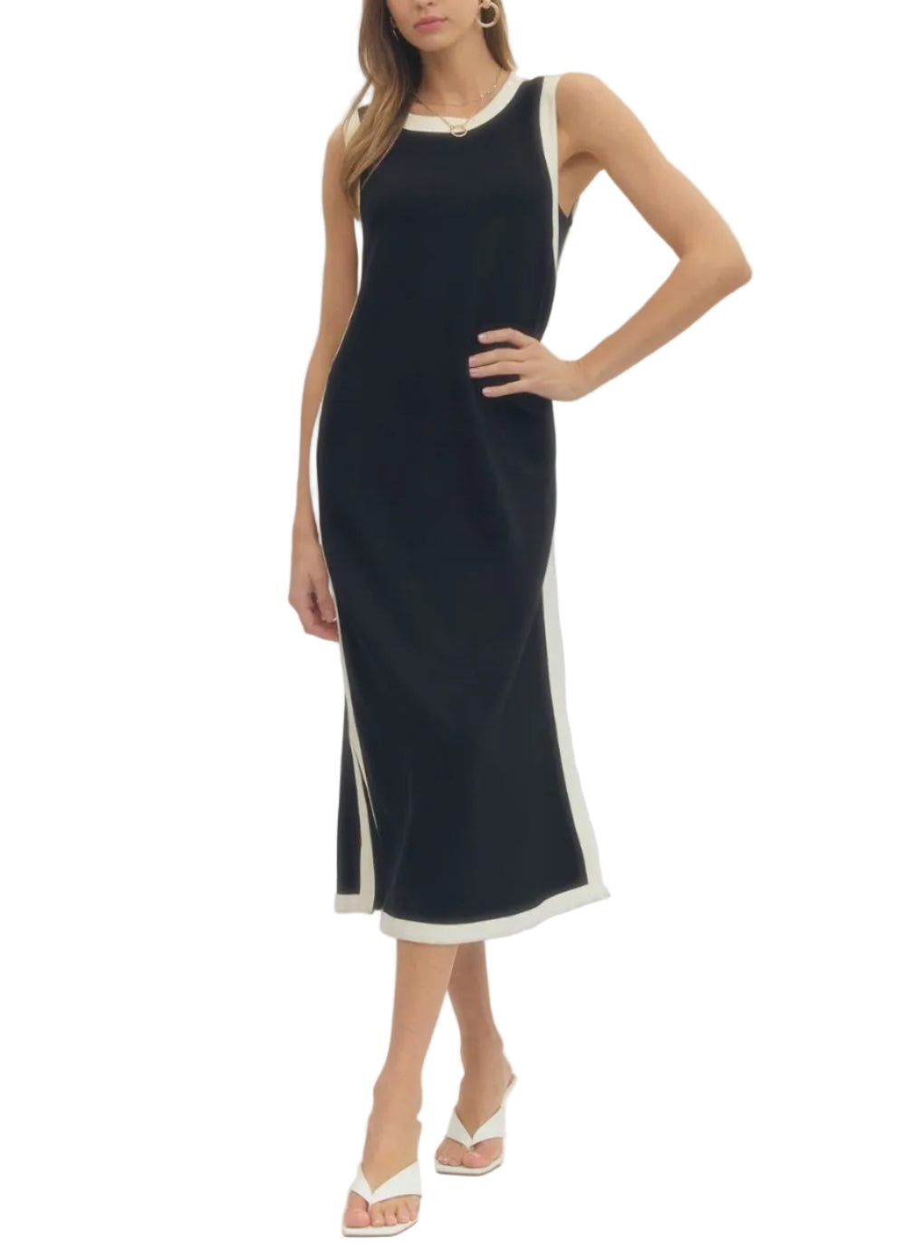 Solid sleeveless midi dress featuring contrast binding along neckline, armholes, and hem. Side slit at hem. Unlined. Knit. Non-sheer. Lightweight.
