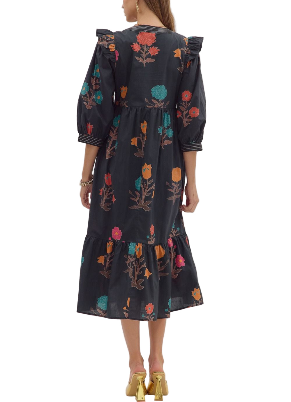 Floral print 3/4 puff sleeve midi dress featuring V-neck with contrast stitch detail and ruffle shoulder accents. Side pockets. Ruffle hem. Lined. Woven. Non-sheer. Lightweight.