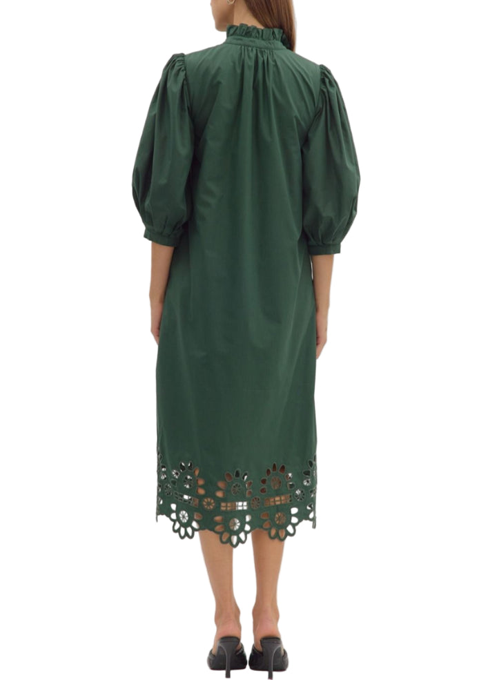 Solid 3/4 puff sleeve midi dress featuring ruffled accent band collar with partial button closure at front. Side pockets. Scallop cutout hem. Lined. Woven. Non-sheer. Lightweight.
