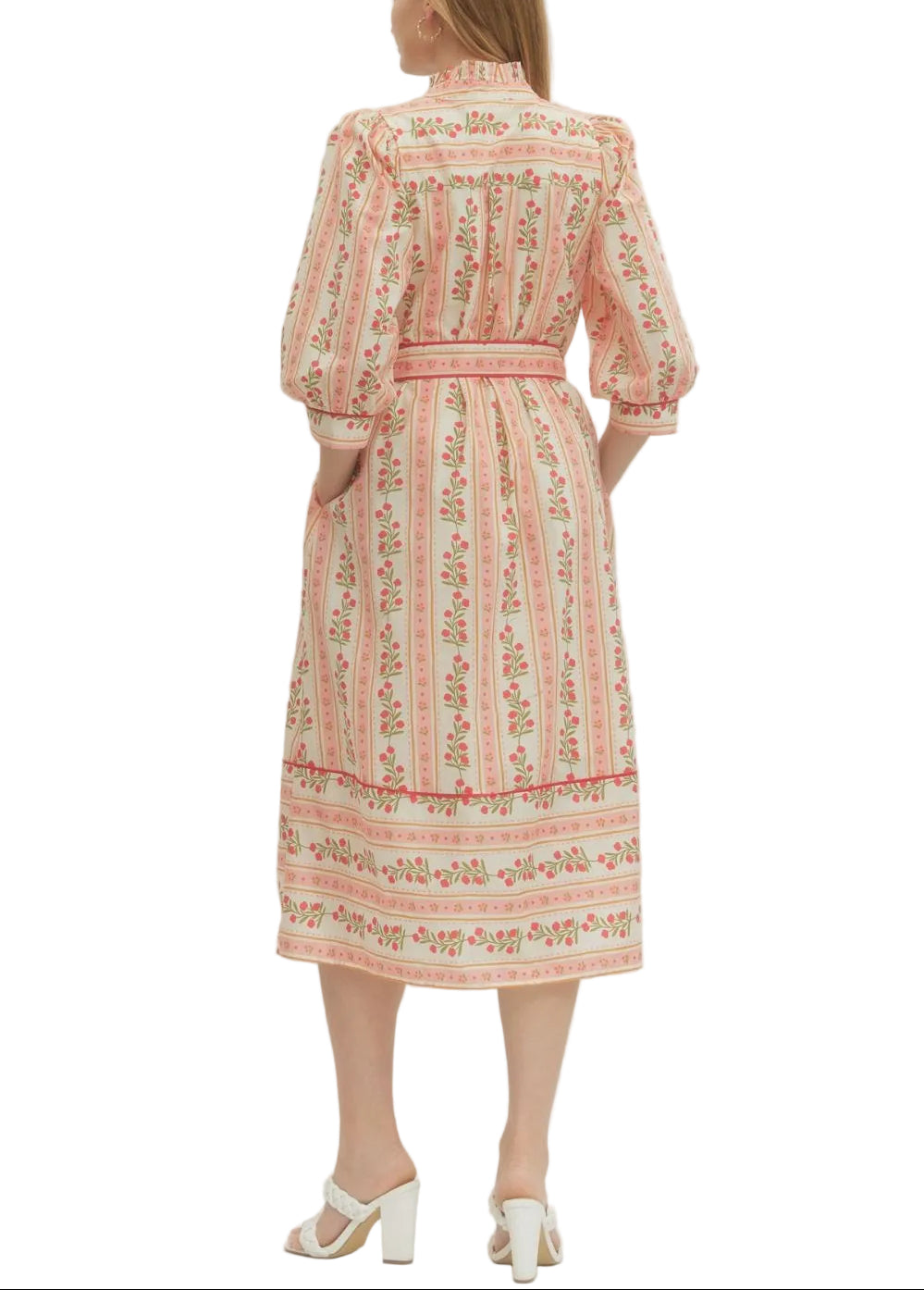 Twirl into spring with the Dylan Floral Stripe Midi Dress—where cheerful blooms meet classic stripes for a look that's equal parts whimsical and wearable. The midi length hits just right for effortless elegance, while the mixed print keeps things fun and fresh. Perfect for garden parties, weekend brunches, or whenever you want to add a splash of color to your day.