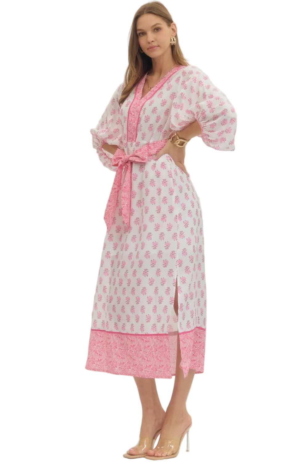 Effortlessly chic and undeniably fun, the Hazel midi dress strikes the perfect balance between polished and playful. The three-quarter sleeves offer just the right amount of coverage, while the tie waist cinches your silhouette for a flattering, customizable fit. Perfect for everything from casual brunches to evening outings, this versatile piece transitions seamlessly through your week. Dress it up with heels or keep it relaxed with sneakers—either way, you'll feel confident and comfortable.