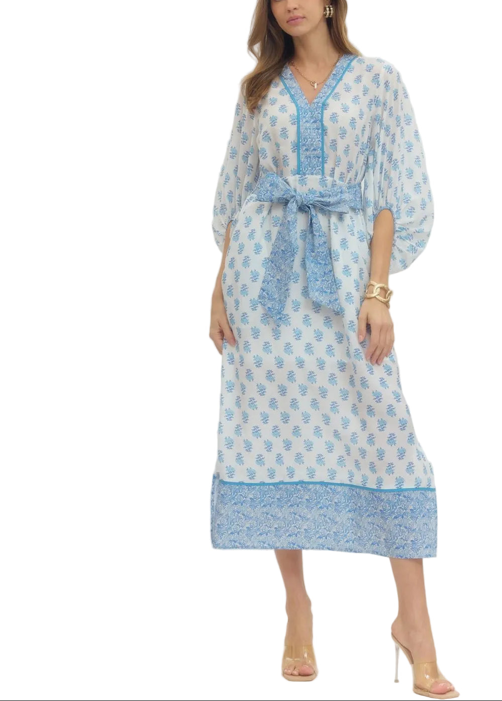 Effortlessly chic and undeniably fun, the Hazel midi dress strikes the perfect balance between polished and playful. The three-quarter sleeves offer just the right amount of coverage, while the tie waist cinches your silhouette for a flattering, customizable fit. Perfect for everything from casual brunches to evening outings, this versatile piece transitions seamlessly through your week. Dress it up with heels or keep it relaxed with sneakers—either way, you&