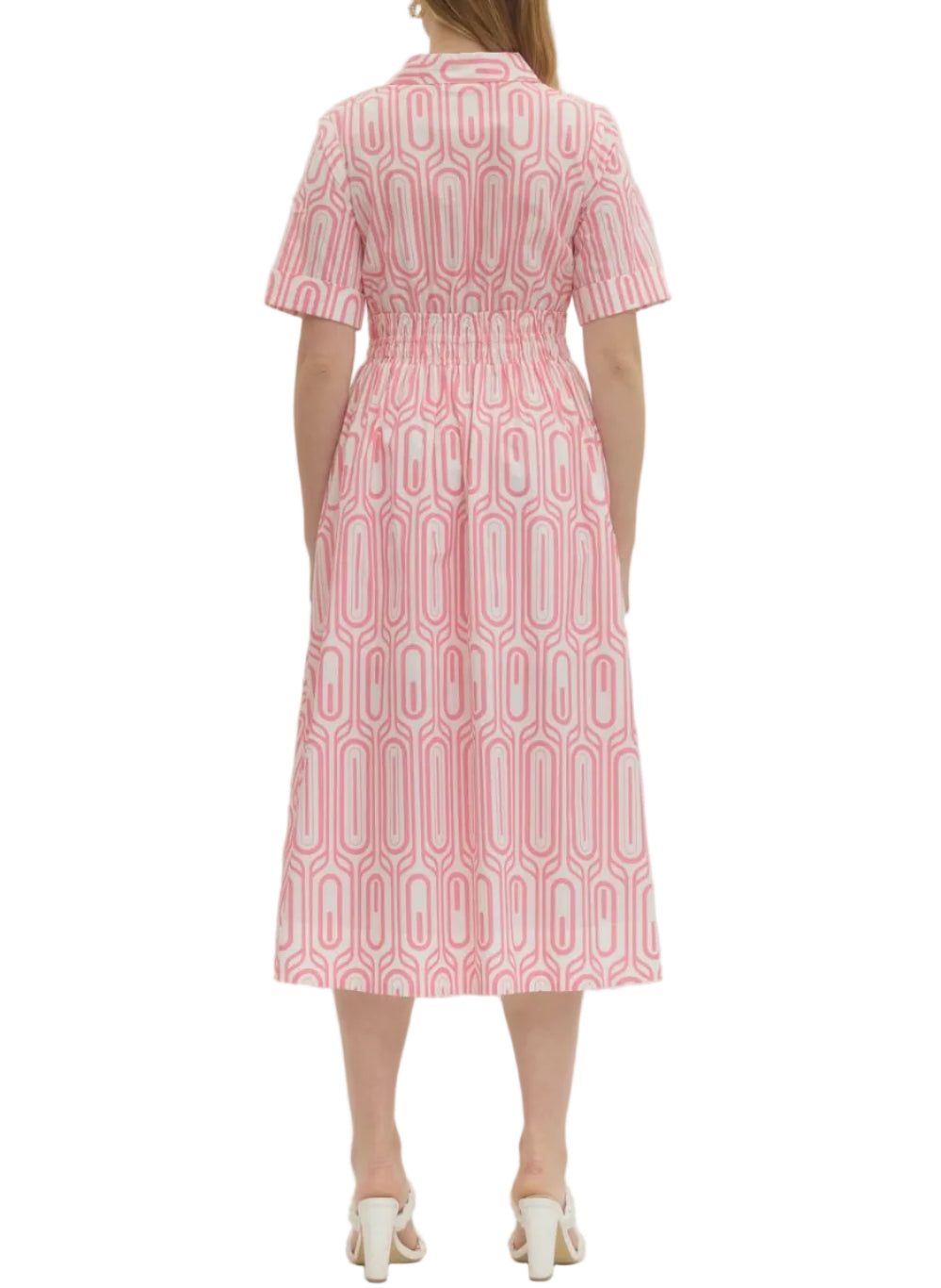 Geometric print short sleeve midi dress featuring elasticated waist detail and button closure at front. Side pockets. Lined. Woven. Non-sheer. Lightweight.
