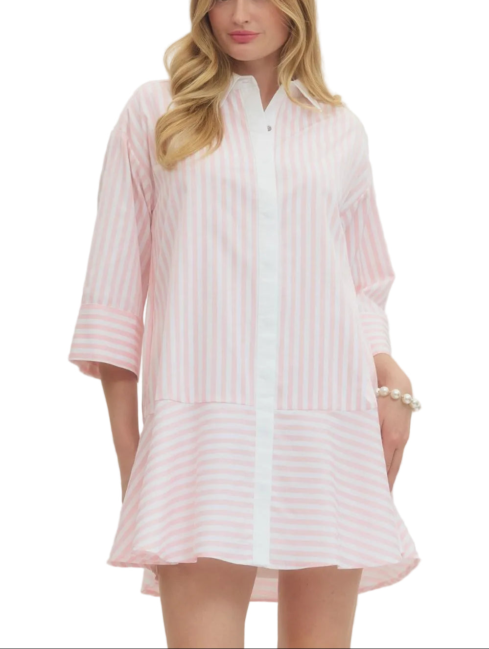 Playful stripes meet effortless style in this charming mini dress. The classic striped pattern brings a timeless appeal, while tailored sleeve cuffs add a polished finishing touch. Perfect for casual outings or dressed-up occasions, this versatile piece transitions seamlessly from day to night. Comfortable, chic, and endlessly wearable—your new go-to dress awaits.