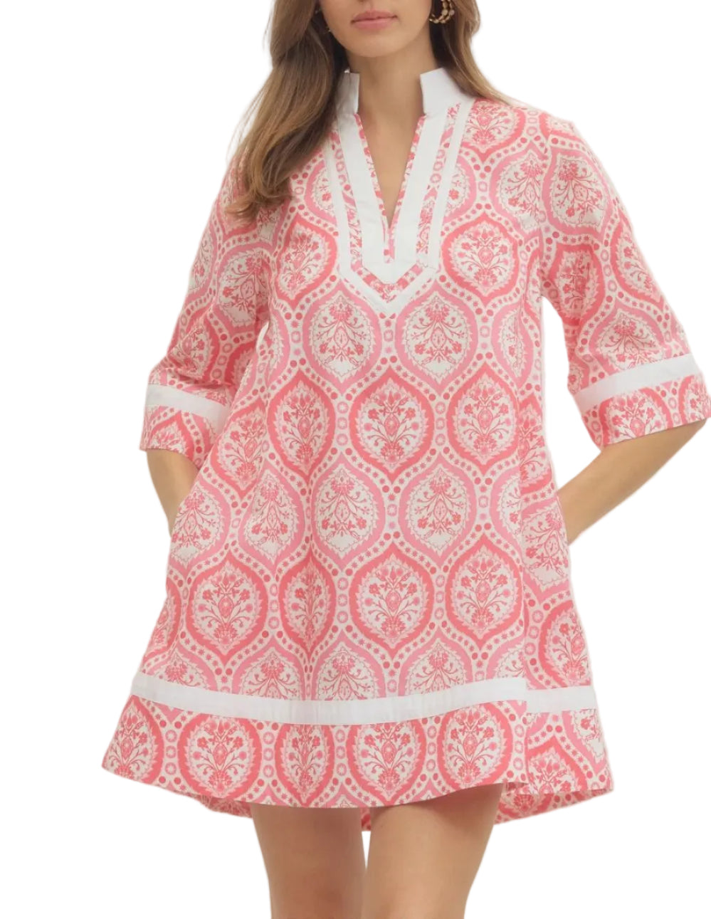 Botanical print 3/4 sleeve mini dress featuring contrast trim V-neck and collar detail. Side pockets. Lined. Woven. Non-sheer. Lightweight.
