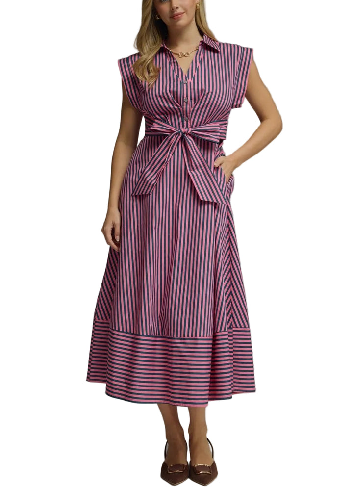 The Meg Striped Midi Dress combines timeless style with everyday versatility. Featuring classic stripes and flattering cap sleeves, this midi-length dress transitions seamlessly from casual outings to weekend gatherings. The relaxed fit and midi silhouette offer comfortable all-day wear, while the striped pattern adds visual interest to your wardrobe. Perfect for layering with a cardigan or jacket, this dress is a wardrobe essential that works across seasons.