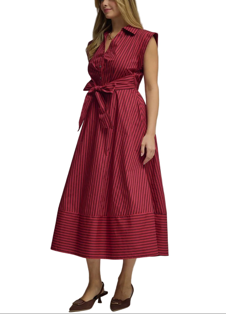 The Meg Striped Midi Dress combines timeless style with everyday versatility. Featuring classic stripes and flattering cap sleeves, this midi-length dress transitions seamlessly from casual outings to weekend gatherings. The relaxed fit and midi silhouette offer comfortable all-day wear, while the striped pattern adds visual interest to your wardrobe. Perfect for layering with a cardigan or jacket, this dress is a wardrobe essential that works across seasons.