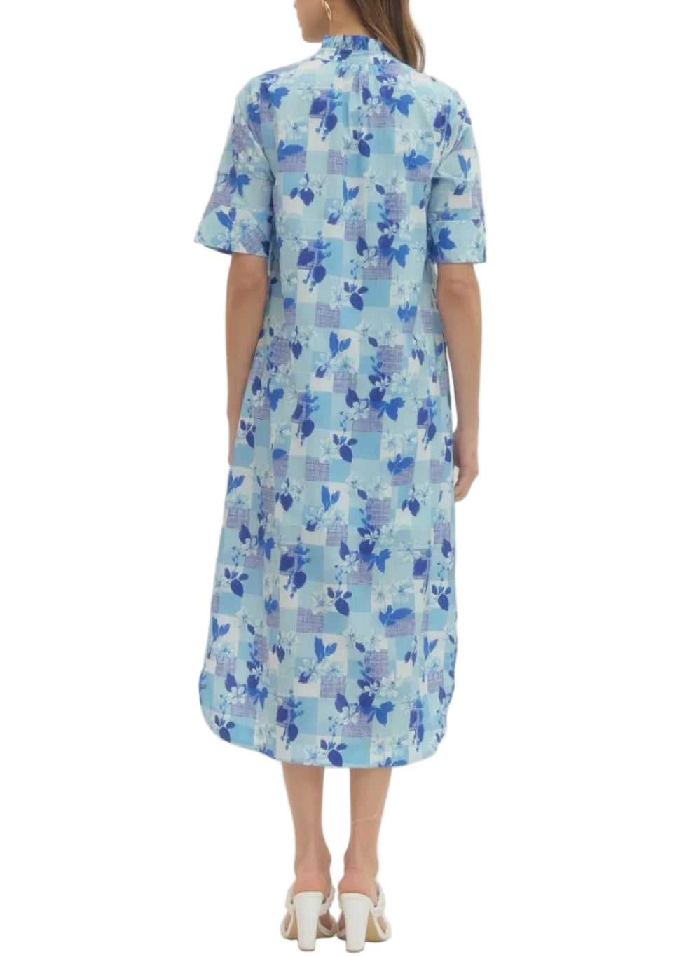 Print short sleeve with slit opening midi dress featuring ruffled neck detail and button closure at front. Side pockets. Lined. Woven. Non-sheer. Lightweight.
