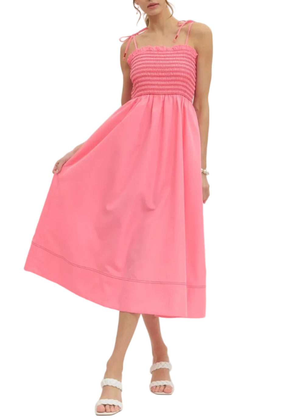 Solid sleeveless midi dress featuring smocked bodice. Tie shoulder straps. Side pockets. Lined. Woven. Non-sheer. Lightweight.
