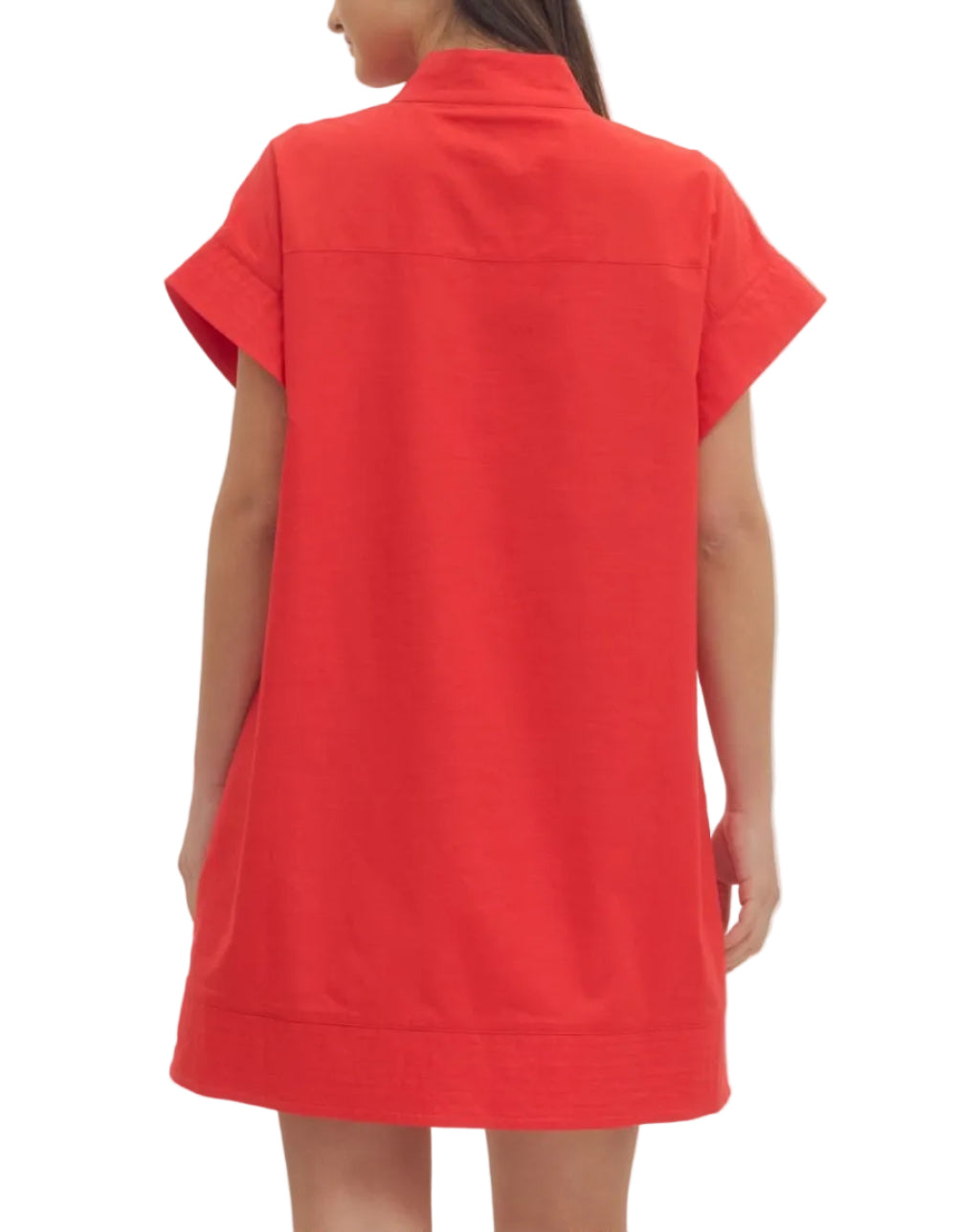 Solid short sleeve mini dress featuring hidden button placket. Side pockets. Lined. Woven. Non-sheer. Lightweight.