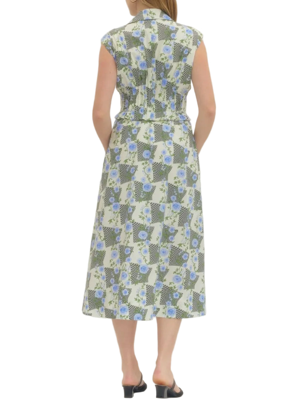Floral print sleeveless midi dress featuring front zip closure and ruched waist detail. Side pockets. Lined. Woven. Non-sheer. Lightweight.