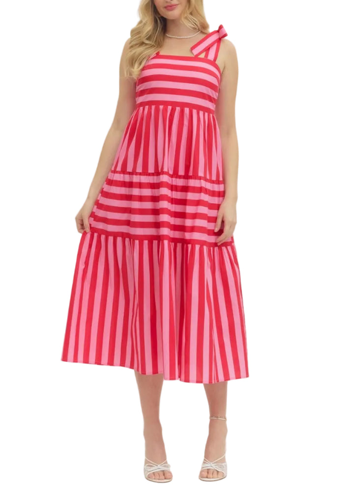 Striped sleeveless midi dress featuring bow shoulder straps. Smocked back bodice. Side pockets. Lined. Woven. Non-sheer. Lightweight.
