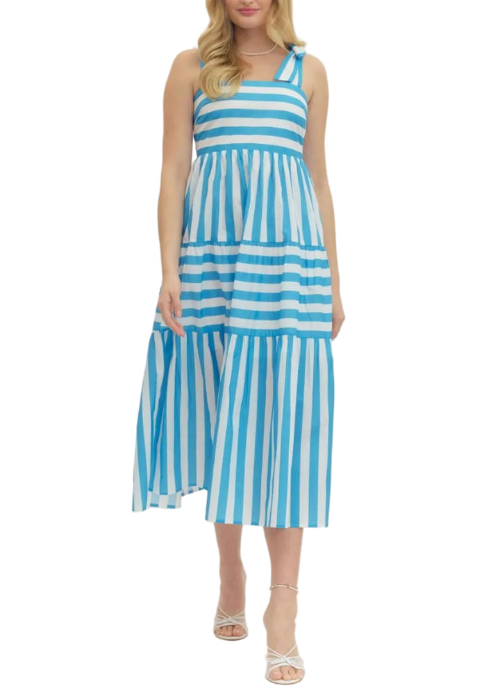 Striped sleeveless midi dress featuring bow shoulder straps. Smocked back bodice. Side pockets. Lined. Woven. Non-sheer. Lightweight.
