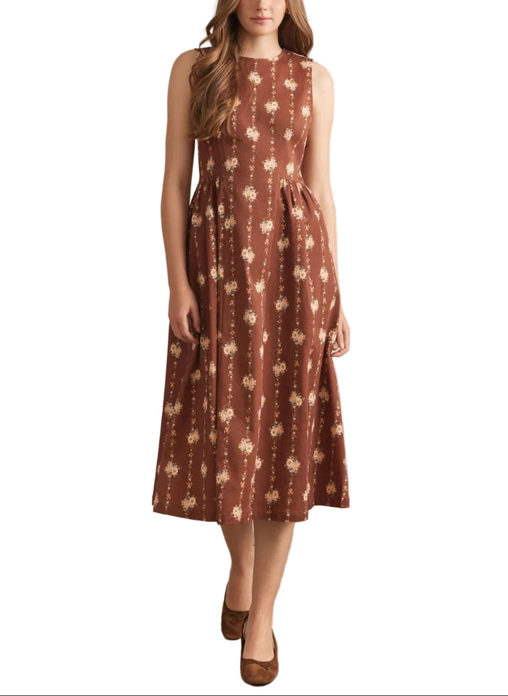Floral print sleeveless midi dress featuring gathered waist detail. Back zipper closure. Side pockets. Unlined. Woven. Non-sheer. Lightweight.