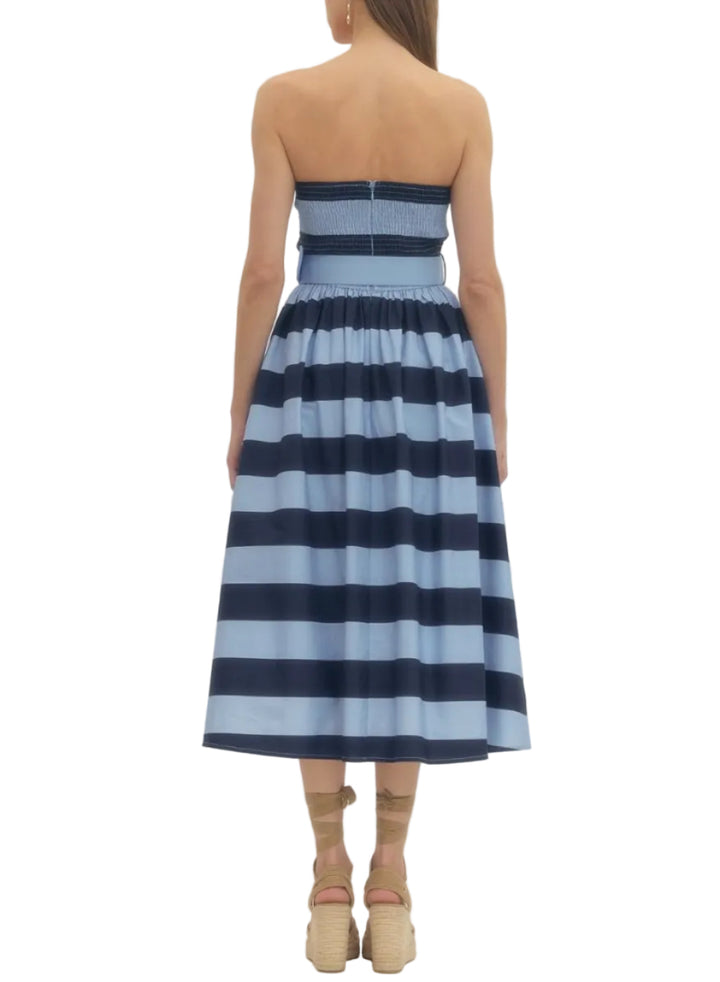 Striped strapless midi dress featuring contrast waistband with buckle detail. Zipper closure at back. Smocked back bodice. Side pockets. Lined. Woven. Non-sheer. Lightweight.