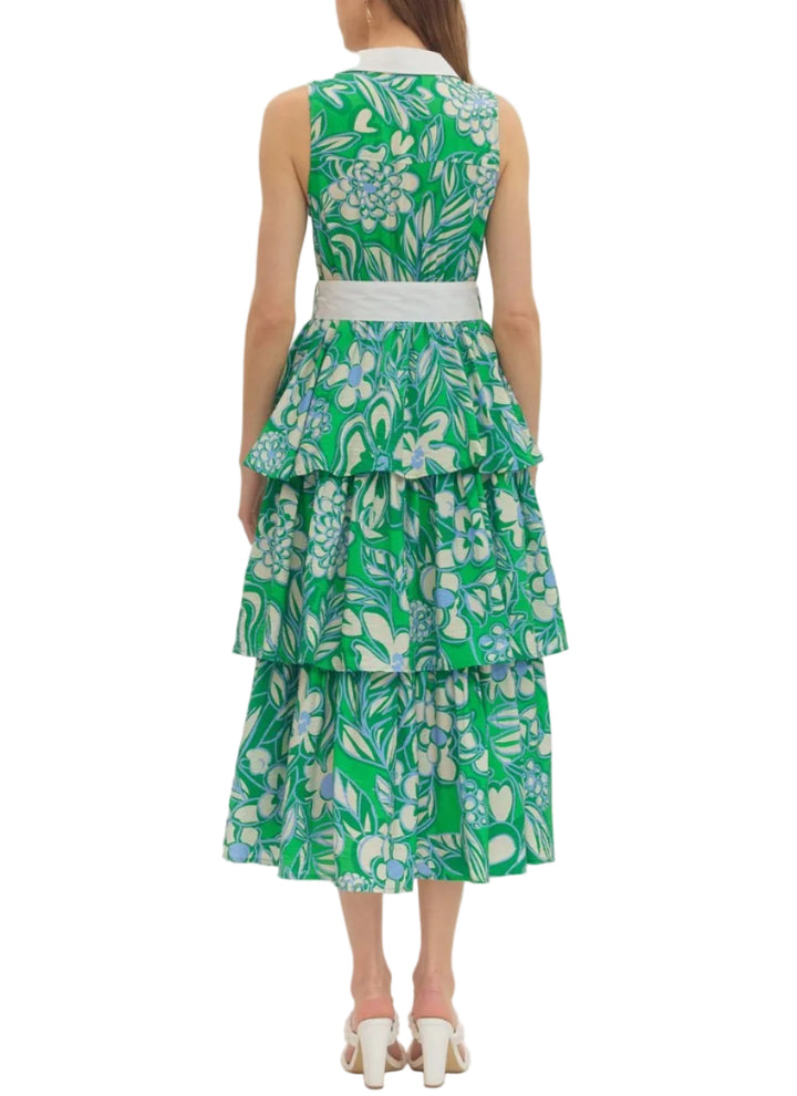 Botanical print sleeveless tiered midi dress featuring contrast collar placket. Button closure at front. Self-tie belt at waist. Side pockets. Lined. Woven. Non-sheer. Lightweight.
