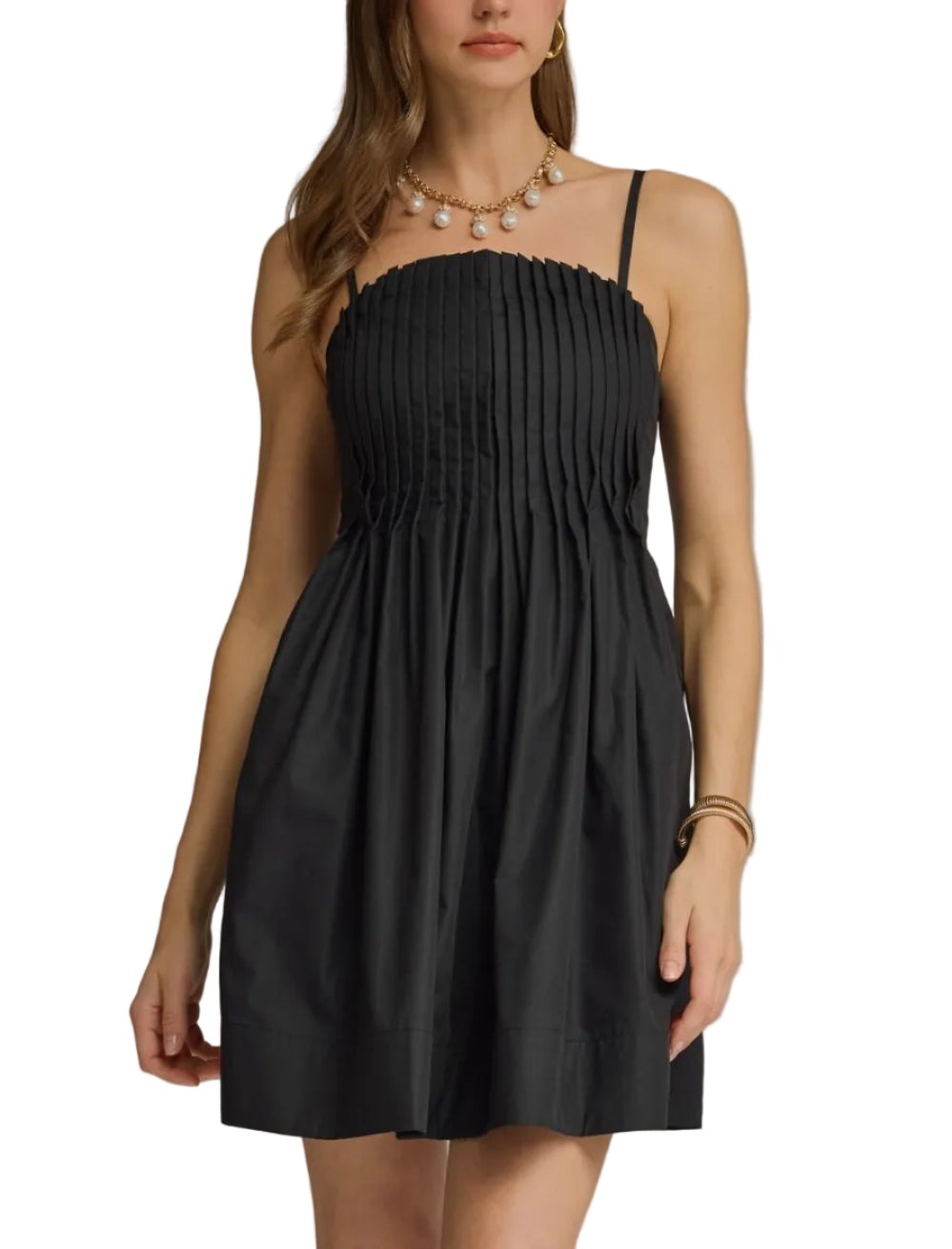 Solid straight neck sleeveless mini dress featuring pleated bodice detail. Adjustable shoulder straps. Smocked back. Side pockets. Lined. Woven. Non-sheer. Lightweight.
