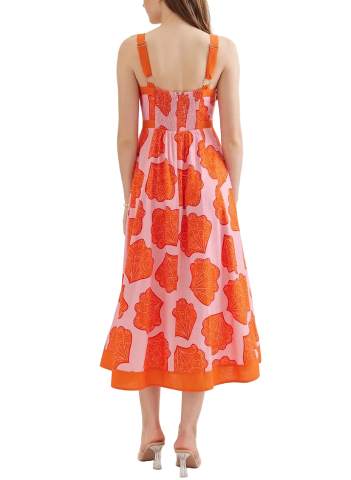 Print sleeveless midi dress featuring square neckline. Adjustable shoulder strap with ring detail. Smocked back with zipper closure. Side pockets. Lined. Woven. Non-sheer. Lightweight.
