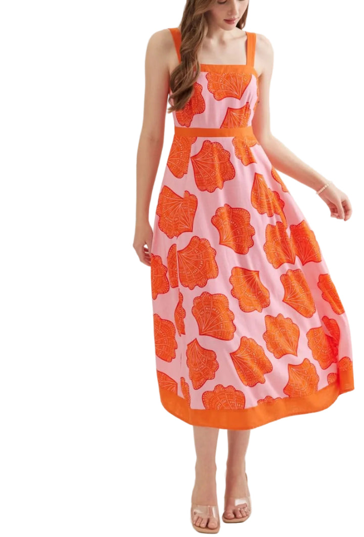 Print sleeveless midi dress featuring square neckline. Adjustable shoulder strap with ring detail. Smocked back with zipper closure. Side pockets. Lined. Woven. Non-sheer. Lightweight.
