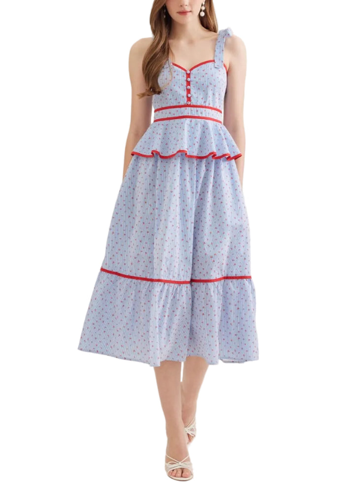 Striped sleeveless midi dress featuring peplum waist detail. Self-tie shoulder straps. Nonfunctional button detail at front bodice. Smocked back. Zipper closure at back. Side pockets. Lined. Woven. Non-sheer. Lightweight.