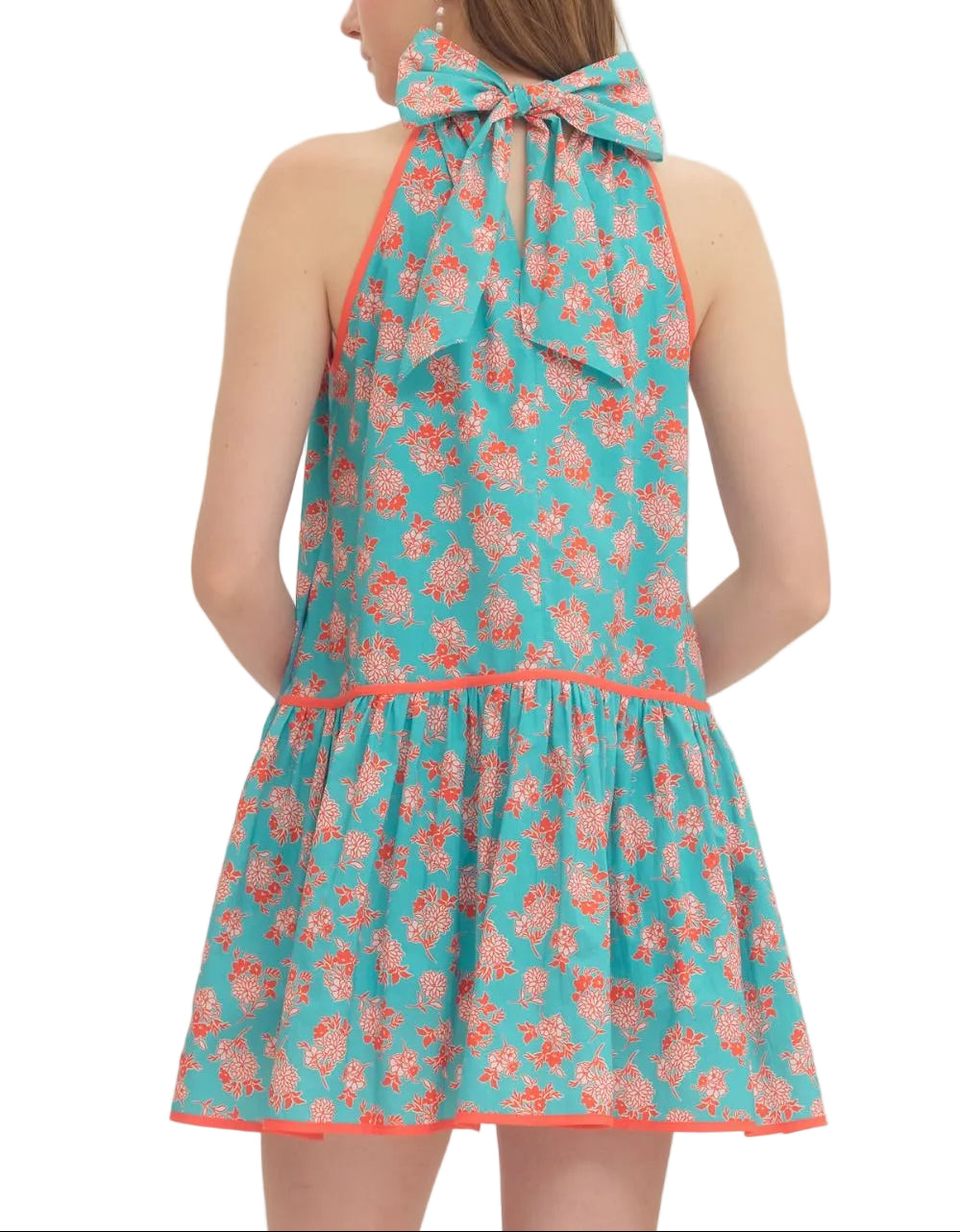 Floral print sleeveless mini dress featuring self-tie halter neckline. Drop waist seam. Contrast binding detail. Side pockets. Lined. Woven. Non-sheer. Lightweight.