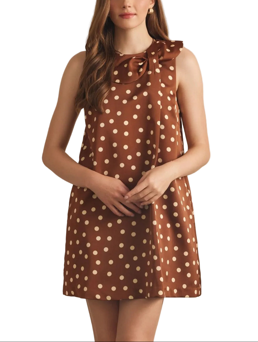 The Aria Polka Dot Short Dress brings effortless charm to your warm-weather wardrobe. This sleeveless design features a classic polka dot pattern in rich brown tones, perfect for creating a vintage-inspired look. The distinctive ribbon neckline adds an elegant finishing touch, offering a flattering silhouette that transitions seamlessly from casual daytime wear to evening occasions. Lightweight and comfortable, this dress is ideal for layering or wearing solo during warmer months.