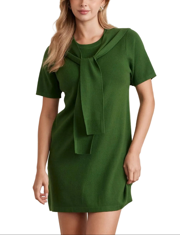 Solid short sleeve sweater mini dress featuring attached layered scarf detail. Unlined. Knit. Non-sheer. Lightweight.