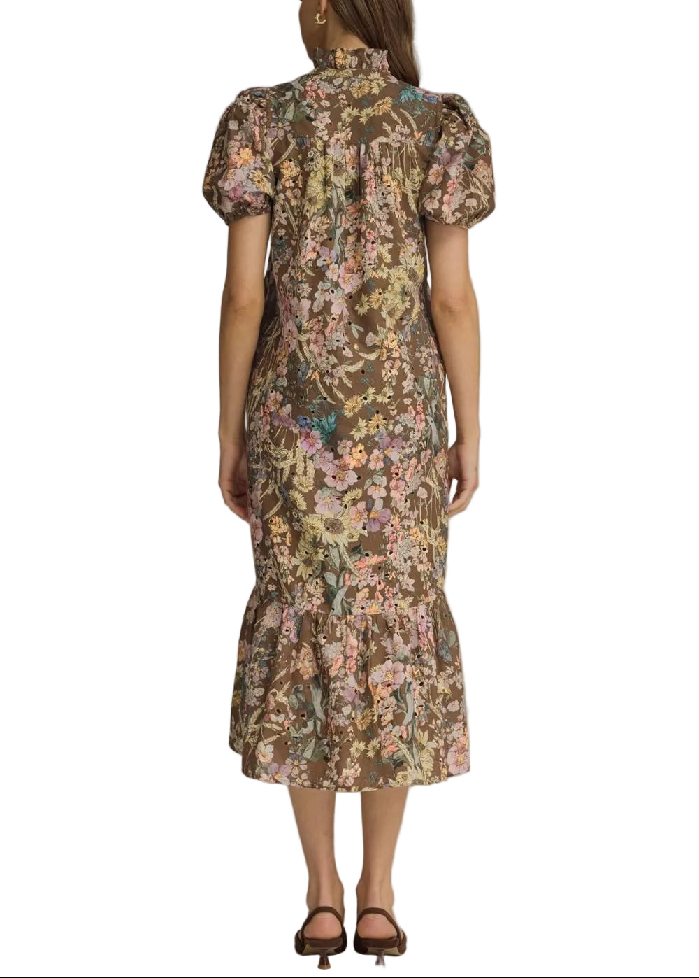 Floral eyelet short puff sleeve midi dress featuring ruffled neck band collar V-neck. Button closure at front. Side pockets. Lined. Woven. Non-sheer. Lightweight.