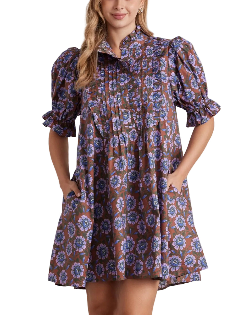 Floral print ruffled neck short puff sleeve mini dress featuring pleated front detail. Button closure at front. Side pockets. Lined. Woven. Non-sheer. Lightweight.