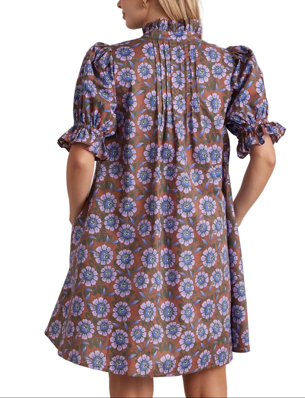 Floral print ruffled neck short puff sleeve mini dress featuring pleated front detail. Button closure at front. Side pockets. Lined. Woven. Non-sheer. Lightweight.
